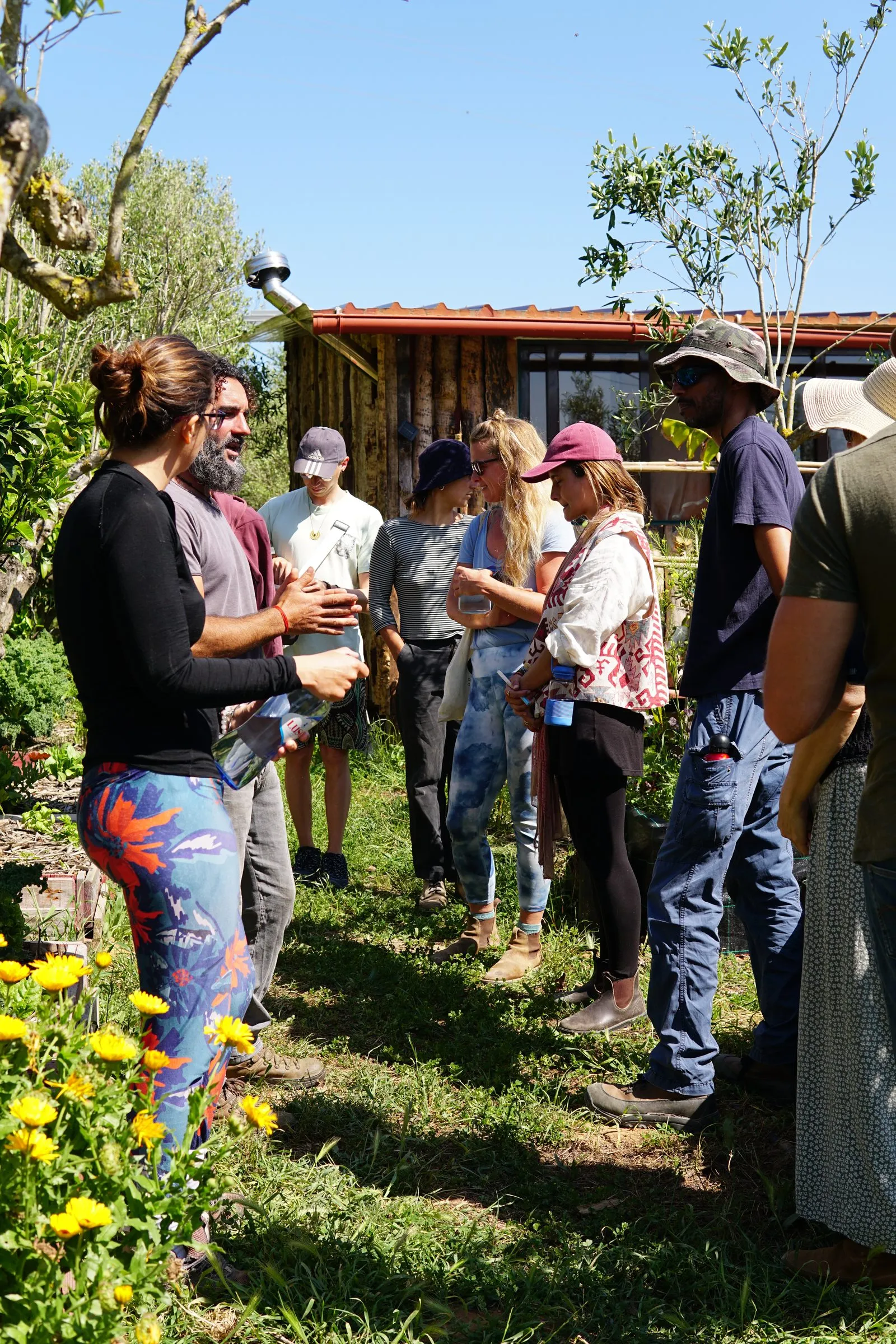 A group learning in the garden